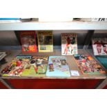 SHELF OF SPORTS BOOKS INCLUDING SHOOT ANNUALS