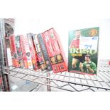 APPROXIMATELY 11x VHS VIDEOS INCLUDING MAN UNITED OFFICIAL HISTORY, GEORGE BEST, DWIGHT YORKE, THE