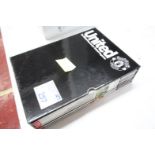 BLACK BOX AND CONTENTS OF 12x 2002 UNITED OFFICIAL MAGAZINES.
