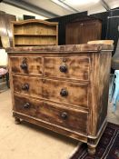 Low chest of four drawers with turned handles on bun feet, approx 47cm x 99cm x 88cm tall