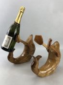 Pair of carved wooden drunken ducks bottle holders