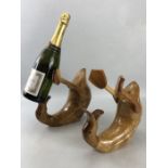 Pair of carved wooden drunken ducks bottle holders