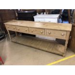 Very large pine farmhouse kitchen sideboard with four large drawers and shelf under, on turned front