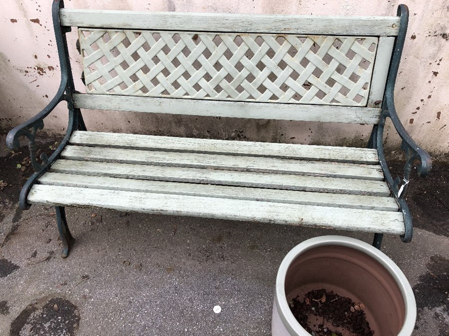 Garden Bench with Wrought iron ends and back painted in green with a similar coloured Garden pot - Image 4 of 5