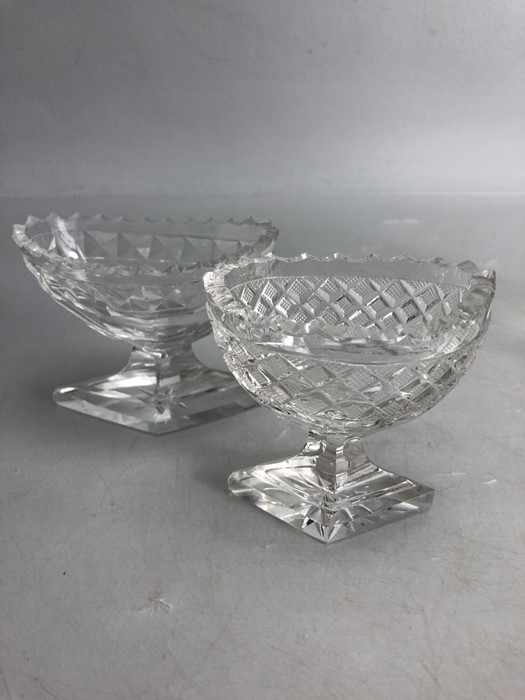 Two Glass Georgian boat shaped salts on stepped bases
