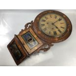 Antique drop dial wall clock with label to the interior which reads "Superior Eight Day" with