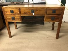 Modern light oak desk of five drawers on square legs, approx 50cm x 130cm x 80cm tall