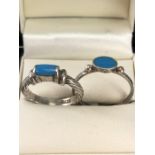 Two Silver rings set with Turquoise stones sixe K & R