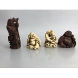 Collection of four netsuke two carved bone and two carved wooden figurines