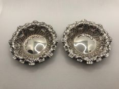 Pair of Victorian Sheffield Hallmarked Silver pin dishes approx 41.6g with repoussé decoration 1895