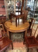 Imported Chinese rosewood extending circular (approx 112cm diameter) dining table with carved