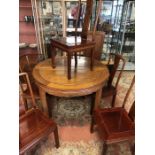 Imported Chinese rosewood extending circular (approx 112cm diameter) dining table with carved