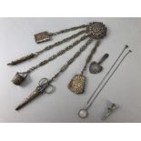 Victorian silver coloured chatelaine with five chains, carrying a silver pencil, aid memoire etc and
