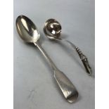 Hallmarked London Silver serving spoon and a silver ladle marked Sterling (total weight approx