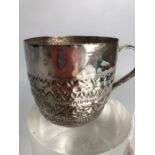 An attractive Silver cup crudely embossed (approx 47g) approx 5.5cm tall