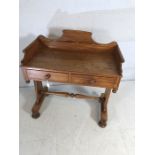 Pine washstand with two drawers and turned stretcher on bun feet