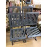 Four grey painted folding slat-backed garden chairs