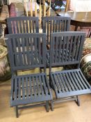 Four grey painted folding slat-backed garden chairs