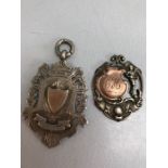 Two Hallmarked silver and gold medals total weight approx 30g