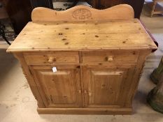 Small pine sideboard with carved upstand, two drawers and cupboard under, approx 91cm x 41cm x