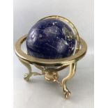 Gem set terrestrial globe upon a brass stand