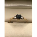9ct Gold ring with faceted heart shaped stone approx 'N'