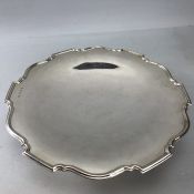 Silver hallmarked large dish on single foot approx 552g/ 26cm diameter