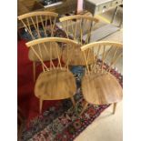 Set of four Ercol sick back chairs