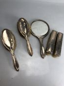 Silver all English hallmarked Dressing table set comprising four brushes and a mirror