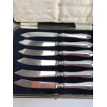 Set of six silver handled fish knives in presentation case