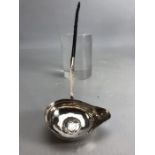 Georgian Silver toddy ladle with twisted handle and a George II coin inset to the bowl