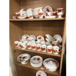 A collection of Wedgwood Susie Cooper design Cornpoppy pattern wares