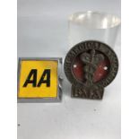 Two car badges the AA & BMA British Medical Association