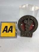 Two car badges the AA & BMA British Medical Association