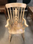 Pine rocking chair with slat-back detail