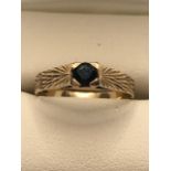 Hallmarked 375 Gold ring with central stone size 'N'