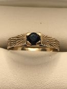 Hallmarked 375 Gold ring with central stone size 'N'