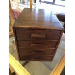 Four drawer oak desktop filing cabinet, approx 33cm x 23cm x 26cm tall