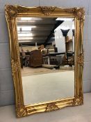 Medium oblong gilt-framed bevel-edged mirror, approx 90cm x 64cm