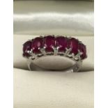 Silver 925 Ring set with six oval red stones size 'Q'