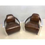 Pair of club chairs in an aviator style, approx 75cm wide x 90cm deep x 75cm tall