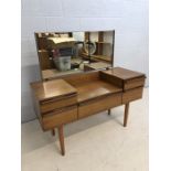 Mid Century Avalon teak dressing table on tapered legs with five drawers and mirror over, approx