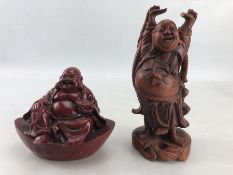 Two Buddha figurines one carved wooden and one Cinnabar