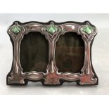 Small silver Art Nouveau style double picture frame, approx 11cm x 8cm