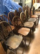 Set of thirteen wheelback dining chairs