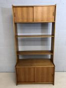 Mid Century storage unit / tall sideboard with cupboards over and under with sliding doors by