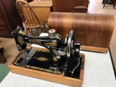 Cased Singer sewing machine with range of original accessories, model number EL826159