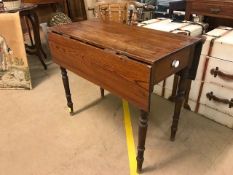 Small drop leaf table on turned legs