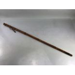 Cane walking stick with horn tip and rose gold top bearing the inscription 'Foy est Tout, the