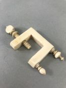 19th Century ivory sewing clamp, approx 17.5cm in length